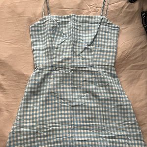 Reformation blue and white gingham dress. Has a zipper in the back. Size 0